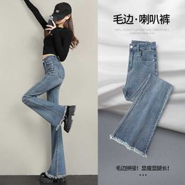 2023 New Womens Spring and Autumn Wear High Waist Slim Small Figure Horseshoe Micro Horn Pants Ragged Edge Jeans