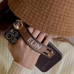 Wrist strap metal buckle designer simple and fashionable design silicone anti drop iphone case suitable for Apple 15pro max 11 12 13 14 Pro Max XR X XS XSMAX 7 8 Plus