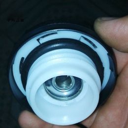 Manufacturer's supply of fuel tank cap (unlocked). Car fuel tank filling port with large quantity of unlocked cap is preferred