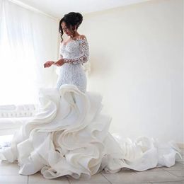 Abito da sposa a sirena alla moda taglie forti Arrivo manica lunga in pizzo musulmano Vestido De Noiva Abiti romantici con volant con applicazioni