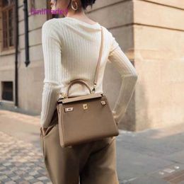 A kelyys 2024 Autumn New Togo Leather Inner Sewn Bag 25cm Texture Practical Handbag Fashion Crossbody