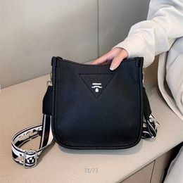 32% OFF Designer bag 2024 Handbags Family Large Embroidered Printed Ribbon Shoulder Strap Envelope Lychee Pattern Cowhide Single Shoulder Womens