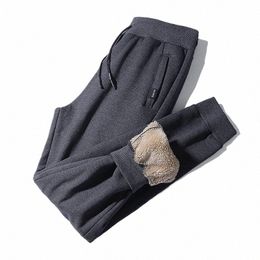 Pantaloni invernali da uomo Pantaloni invernali da uomo Cmere Pantaloni termici casual super caldi Plus Veet Addensare pantaloni elastici in vita sciolti E5d9 #