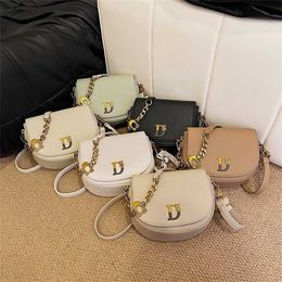 14% OFF Designer bag 2024 Handbags High end for women in spring/summer saddle with fashionable niche semi-circular single shoulder crossbody for women