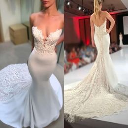 Abiti taglie forti Abiti da sposa africani con volant a sirena e abiti da sposa in raso e pizzo senza schienale Abiti arabi di Dubai