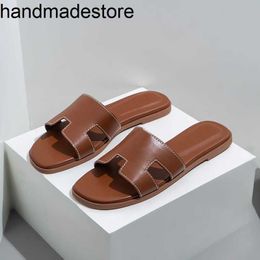 Klassische Orans Sandal Slides Echte Süßigkeiten Mode -Leder -Pantoffeln Frauen Outwear Sommer -Pantoffeln Flach Frauenschuhe vielseitig vielseitig