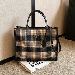 16% OFF Designer bag 2024 Handbags Autumn/Winter Checkered Womens Shoulder Versatile Korean Edition Large Capacity Fashion Tote Womens