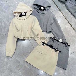 Luxury Women Two Piece Dress 24ss Early Spring New Gaoding Miui Simple and Casual Age Reducing Letter Embroidery Hooded Hoodie Half Skirt Set