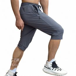 men Running Cropped Pants Ice silk Summer Ice silk Quick Dry Training Fitn Zip Pocket Joggings Pant Male Gym 3/4 Sweatpants W1xk#