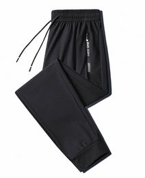 Calças esportivas masculinas sólidas de seda gelo calças de verão homens soltos trabalho casual fi secagem rápida calças esportivas para homens calças lg 55Kd #