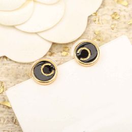 Designer charm small round shape stud earring with black Colour in 18k gold plated have stamp box PS3275B