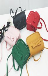 INS Baby Girls Bowknot Messenger Bag PU Leather wallet Cartoon Cute Kids Mini Shoulder bag Boutique Coin Purse 5 colors Z21506711250