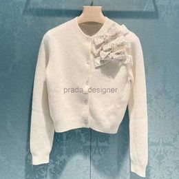 Designer Women's Sweaters 24ss Autumn New Miui Thin Heavy Industry Beaded Bow Cardigan Fashion Round Neck Long Sleeve Short Coat Top
