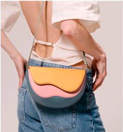 Shoulder Bags 2024 Fashion Leather Bag Unique Small Handbags Women Curve Round Panelled Gril Messenger Crossbody Saddle Clutches