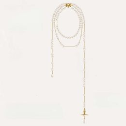 Empress Dowager Xis Broken Pearl Long Necklace with Three Dimensional Saturn Inscription Asymmetric Tassel Sweater Chain