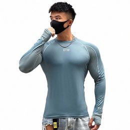 mens Bodybuilding Compri Sport T-shirt Quick Dry Running Tee Lg Sleeve Top Gym Tights Male Fitn Clothing Sweatshirt t2dV#