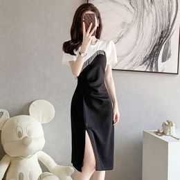 Tea Break French for Women's Summer 2023 New Design Feeling Covering the Stomach and Waist, Showcasing Slender Tassel Small Black Dress Elegance