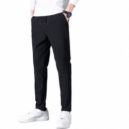 Pantaloni casual da uomo autunno inverno pantaloni sportivi marca sciolto dritto elastico peluche addensato caldo abbigliamento sportivo pantaloni tuta da uomo P5S7 #