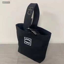 Designer black white women's canvas bag classic letter logo women's fashionable portable bag handbag bento bag travel shopping bag