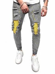 Casual creativo Street Style ad alta elasticità vernice Splatter strappato Design Slim Fit Jeans Denim Pantaloni per la primavera estate 15wD #