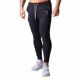2021 Casual New Men's Joggers Pants Fitn Men Sportswear Tracksuit Bottoms Skinny Sweatpants Trousers Gyms Jogger Track Pants M2im#