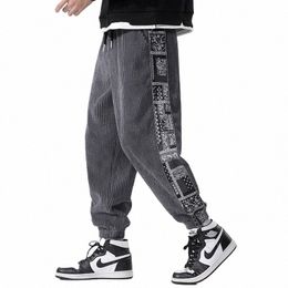 duyit stile cinese stampato cuciture velluto a coste pantaloni casual da uomo autunno / inverno nuovo elastico in vita piccoli piedi pantaloni sportivi d39v #