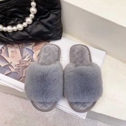 Slippers Slippers Coon slider is suitable for autumn and winter new open toe ome insulation front line with female floor plus H240326479U