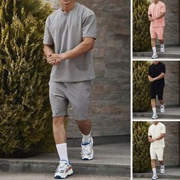 2 pieces/set of sportswear O-neck short sleeved casual set elastic waistband pocket mens solid color T-shirt wide leg shorts set 240326