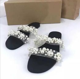 Slippers Slippers women Luxury new style with rhinestone single finger beach sandals outdoor leisure all-match ms Leather home slippers H240326V0V6