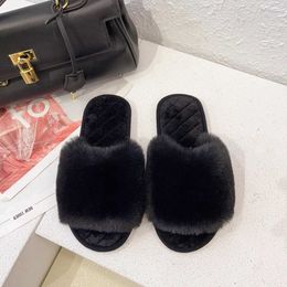 Slippers Slippers Coon slider is suitable for autumn and winter new open toe ome insulation front line with female floor plus H240326RKZH