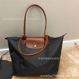 Handbag Store Wholesale Retail High Version Tote Bag 70th Anniversary Large Capacity Waterproof One Shoulder Dumpling Practical