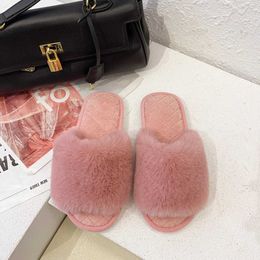 Slippers Slippers Coon slider is suitable for autumn and winter new open toe ome insulation front line with female floor plus H240326N7VS