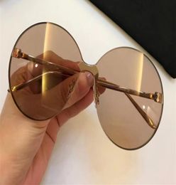Luxury 0353 Designer Sunglasses For Women Fashion Sunglasses Wrap Sunglass Frameless Coating Mirror Lens Carbon Fiber Legs Summer 5966269