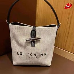 Factory Source High Quality Handbags Is 2024 New French Bag Canvas Bucket Handheld Bamboo Joint Fashionable Single Shoulder Crossbody Trendy