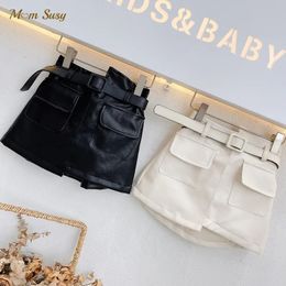 Mode baby girl pu läder kjol kort spädbarn småbarn barnväska midja läder kjol svarta vita babykläder 1-7y 240325