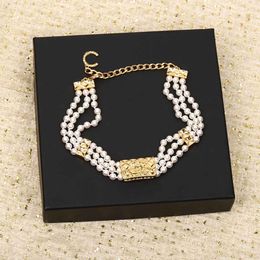 Special designer Jewellery choker with three line layers and nature shell beads in 18k gold plated have stamp box PS3295B