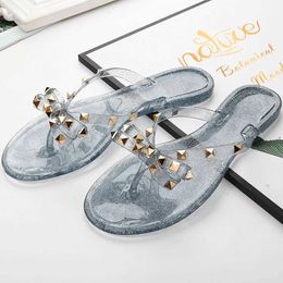 Slippers Slippers 2022 ot Sale Fasion Womens Flip Flops Summer Soes Cool Beac Rivet Big Bow Flat Sandals Jelly Girls Size 36-42 H240326RO7E