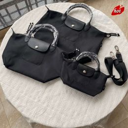 Factory Source High Quality Handbags Is High New 1515 Medium Detachable Shoulder Strap Dumpling Bag Nylon Fabric with Cowhide Casual Hand-held Crossbody