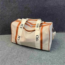 Fashion Luxury Designer Canvas Travel Bags for Men Women Hand Luggage Bags Weekend Overnight Bags Tote Outdoor Storage Bag Large Capacity Duffle Bag