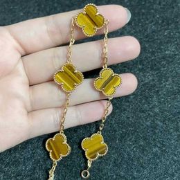 Designer's latest brand High version Van Four Leaf Grass V Gold Five Flower Bracelet Female Tiger Eye Stone Plated 18K Rose Thick