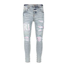 Jeans blu patchwork rosa con ricamo laterale danneggiato vecchio lavato 23ss