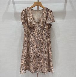 Abito da donna Mini abito con stampa leopardata con scollo a V di marca di moda