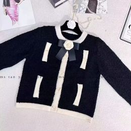 Women's o-neck color block flower pin patched single breasted long sleeve knitted sweater cardigans SML