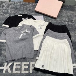 Tute firmate Donna 2 pezzi Kilt Set T-shirt a maniche corte Jogger Tuta sportiva Moda rosa Lettera Abbigliamento sportivo