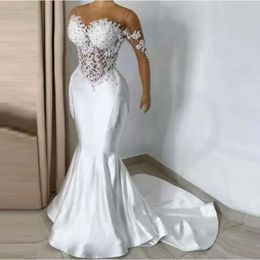 Wedding Tassel Wspaniałe satynowe sukienki syreny koronkowe koraliki ślubne suknie ślubne Sheer szyja iluzja Długie rękawie vestido de novia