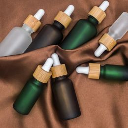 Lastoortsen 100pcs 5ml 10ml 15ml 30ml 50ml 100ml Frosted Amber, Blue, Green Glass Dropper Bottles with Bamboo Lid Pipette Bottle