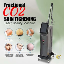 Co2 Laser Fractional Laser Beauty Salon use equipment skin rejuvenation face resurfacing machine acne scar Stretch Marks removal Vagina Care