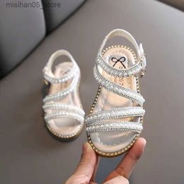 Sandals Girl Princess Flat Shoes Summer Sweet and Elegant Childrens Rhinestone Pearl Sandals Fashion Edition Open Toe Childrens Beach Shoes Q240328