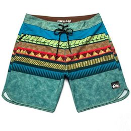 Men's Shorts High quality mens beach pants sewn with printed shorts summer casual loose swimming pants mens hot pants J240328