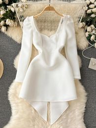 Casual Dresses White Backless Party Dress With Back Bow Women Niche Design Sense Hollow Out Long Sleeve Oversized Gown Women's Clothing